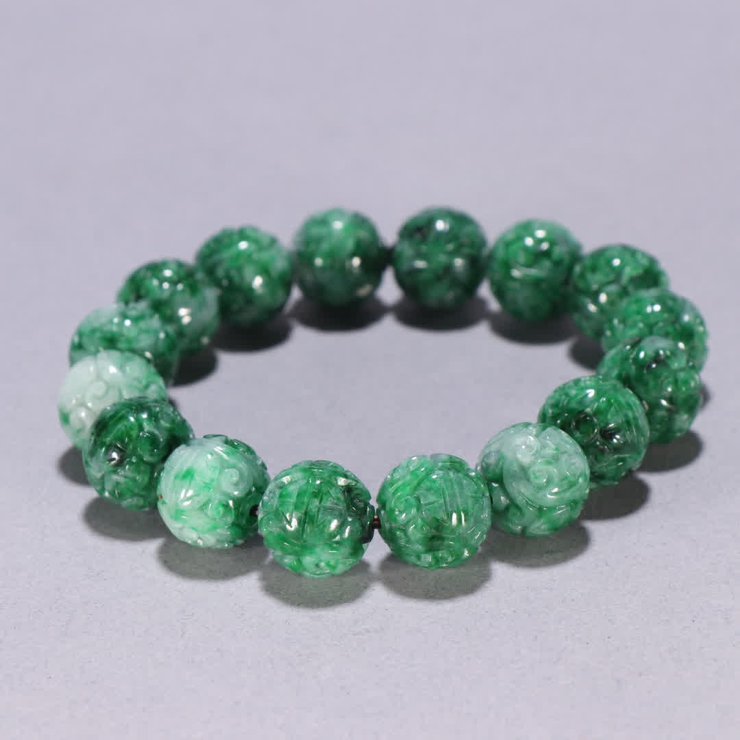 A Qing Dynasty jadeite patterned bracelet - 9