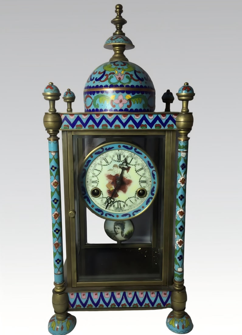 A late Qing dynasty bronze-bodied cloisonne enamel hand clock: Late Qing dynasty copper-bodied cloisonne enamel hand clock SIZE: 210x175x465mm6.2kg (The Dimensions Of All Batches Are Manually Measured.If You Need More Detailed Information, Please Contact Our