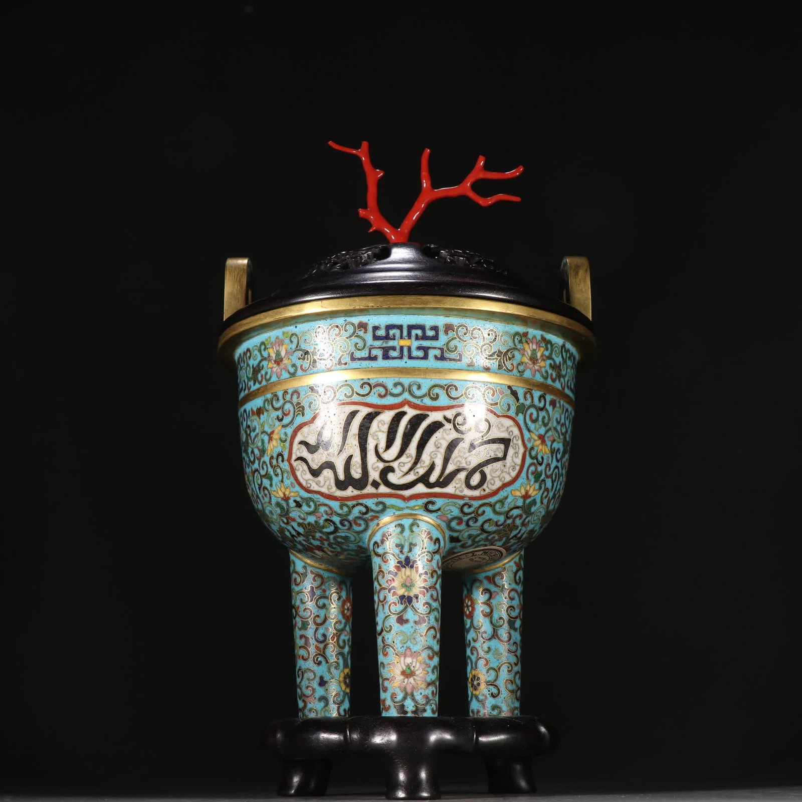 A Qing Dynasty bronze gilt cloisonne with entwined lotus pattern Awen three-legged incense burner: Qing Dynasty bronze gilt cloisonne with entwined lotus pattern Awen three-legged incense burner SIZE: Specifications: H:27.8cm W:15.8cm W:1760.2g (The Dimensions Of All Batches Are Manually Measured.I