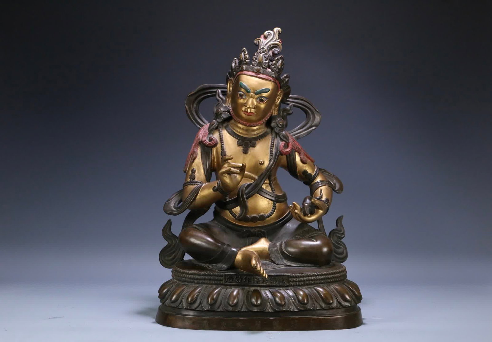 A Qing Dynasty Qianlong Sixth-Rank Buddha Tower, gilt bronze statue of General Zhen Daluo: Qing Dynasty Qianlong Reign, Sixth Grade Buddha Pavilion, gilt bronze statue of General Zhen Daluo SIZE: H:52x37x27cm W:20.3kg (The Dimensions Of All Batches Are Manually Measured.If You Need More