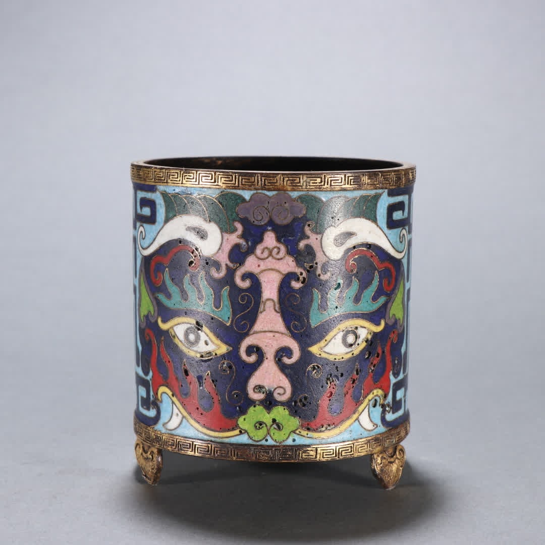 A Qing Dynasty bronze cloisonne three-legged incense burner with gilt coisonn?? beast face pattern: Qing Dynasty bronze gilt cloisonne three-legged incense burner with beast-face motif SIZE: H:9.6cm W:8.7cm W:650g (The Dimensions Of All Batches Are Manually Measured.If You Need More Detailed