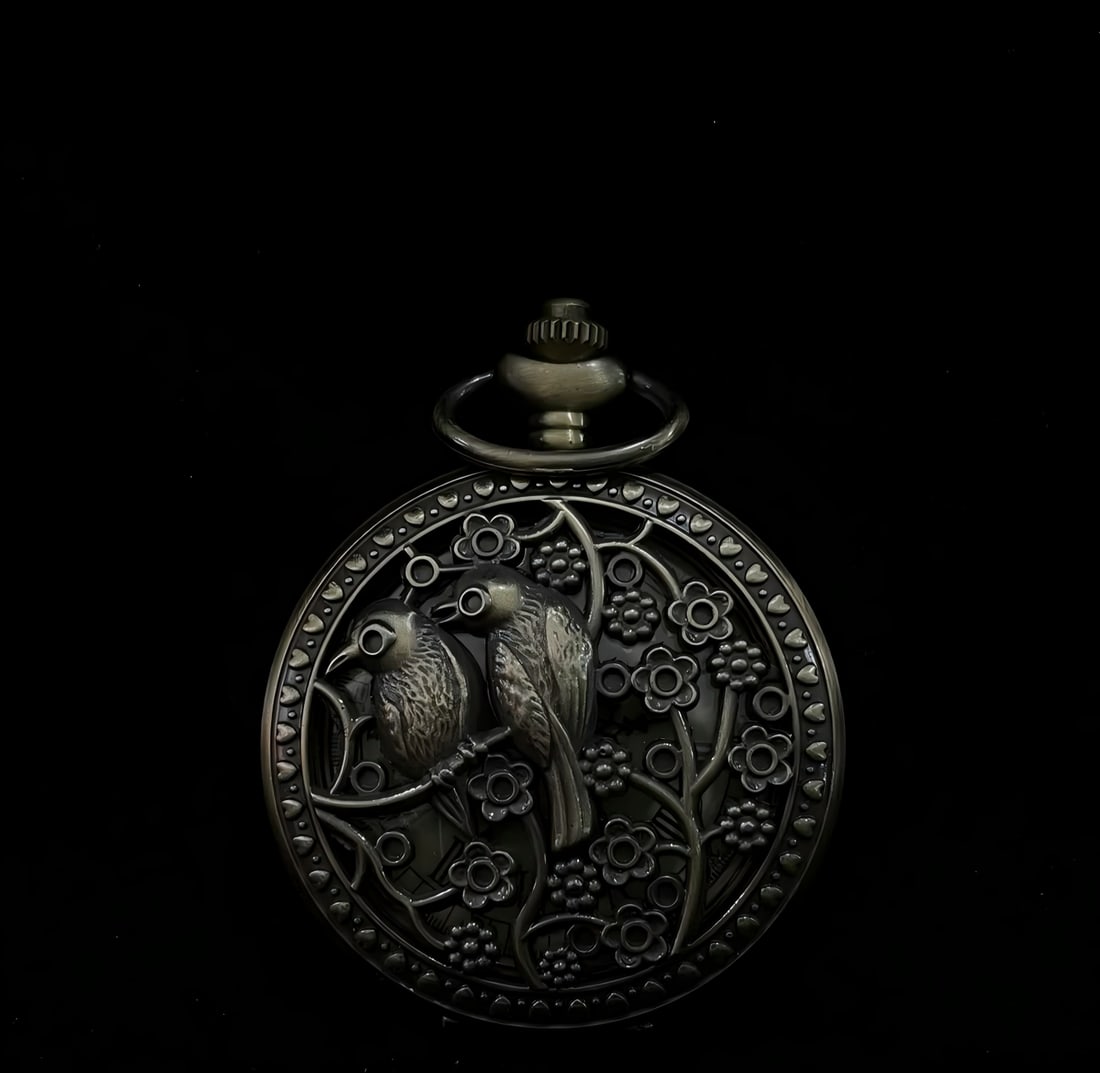 A single-open pocket watch with a relief of birdsong and floral fragrance from the late Qing dynasty: Late Qing Dynasty Birdsong and Fragrant Flowers Relief Single-Open Pocket Watch SIZE: D:45mm (The Dimensions Of All Batches Are Manually Measured.If You Need More Detailed Information, Please Contact