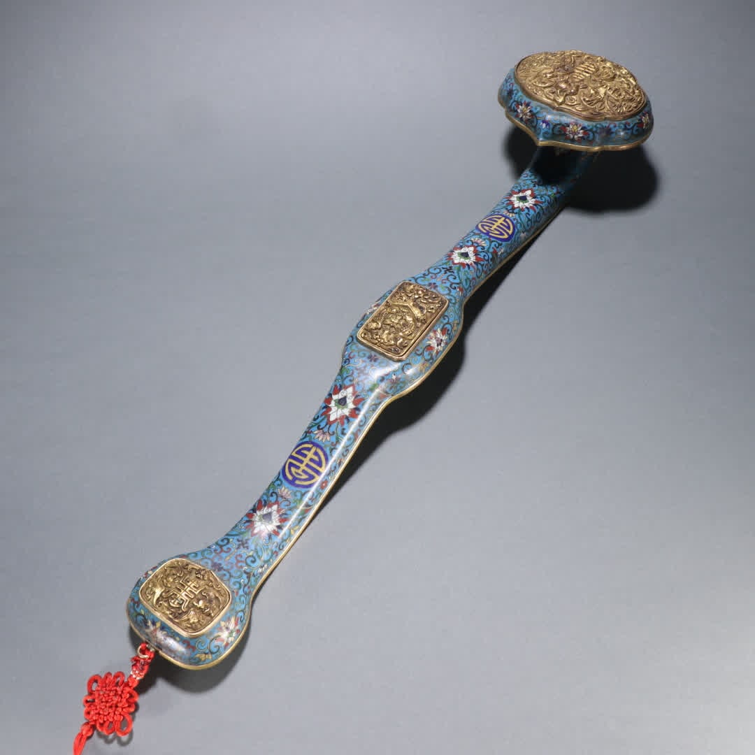 A Qing Dynasty gilt copper cloisonne "Fushou" Ruyi: Qing Dynasty gilt bronze cloisonne "Fushou" Ruyi SIZE: L:52.5cm W:11.7cm W:860g (The Dimensions Of All Batches Are Manually Measured.If You Need More Detailed Information, Please Contact Our Customer
