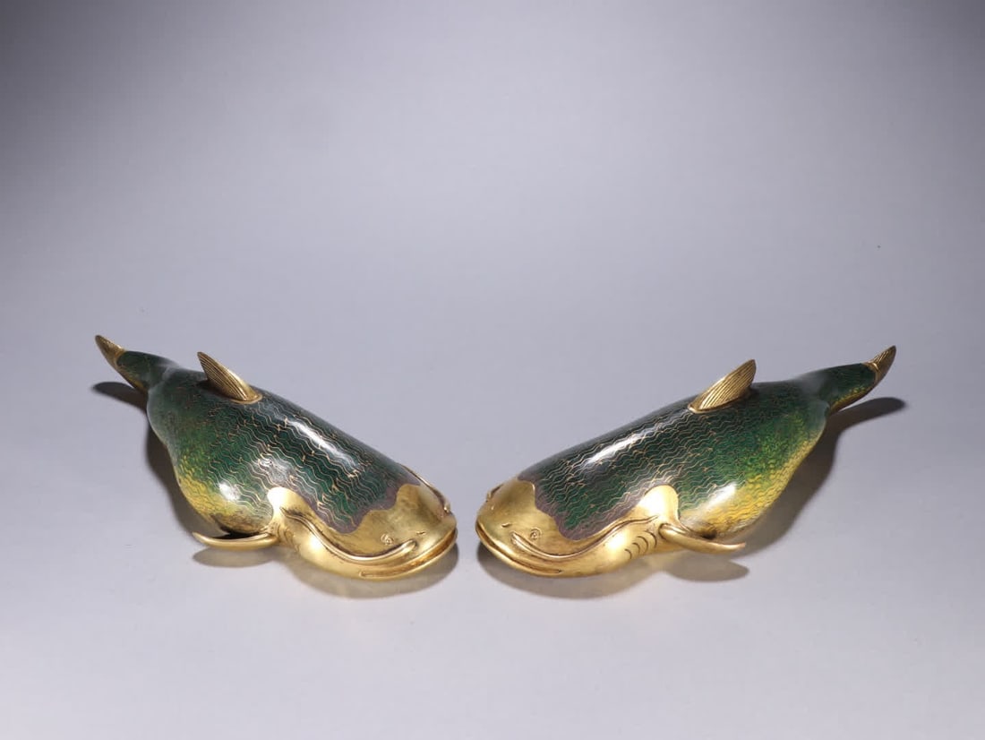 A pair of Qing Dynasty gilt copper cloisonne "Year After Year" figurines: A pair of Qing Dynasty gilt copper cloisonne "Fish Year After Year" ornaments SIZE: L:36.3cm W:9.2cm Each W:930g (The Dimensions Of All Batches Are Manually Measured.If You Need More Detailed