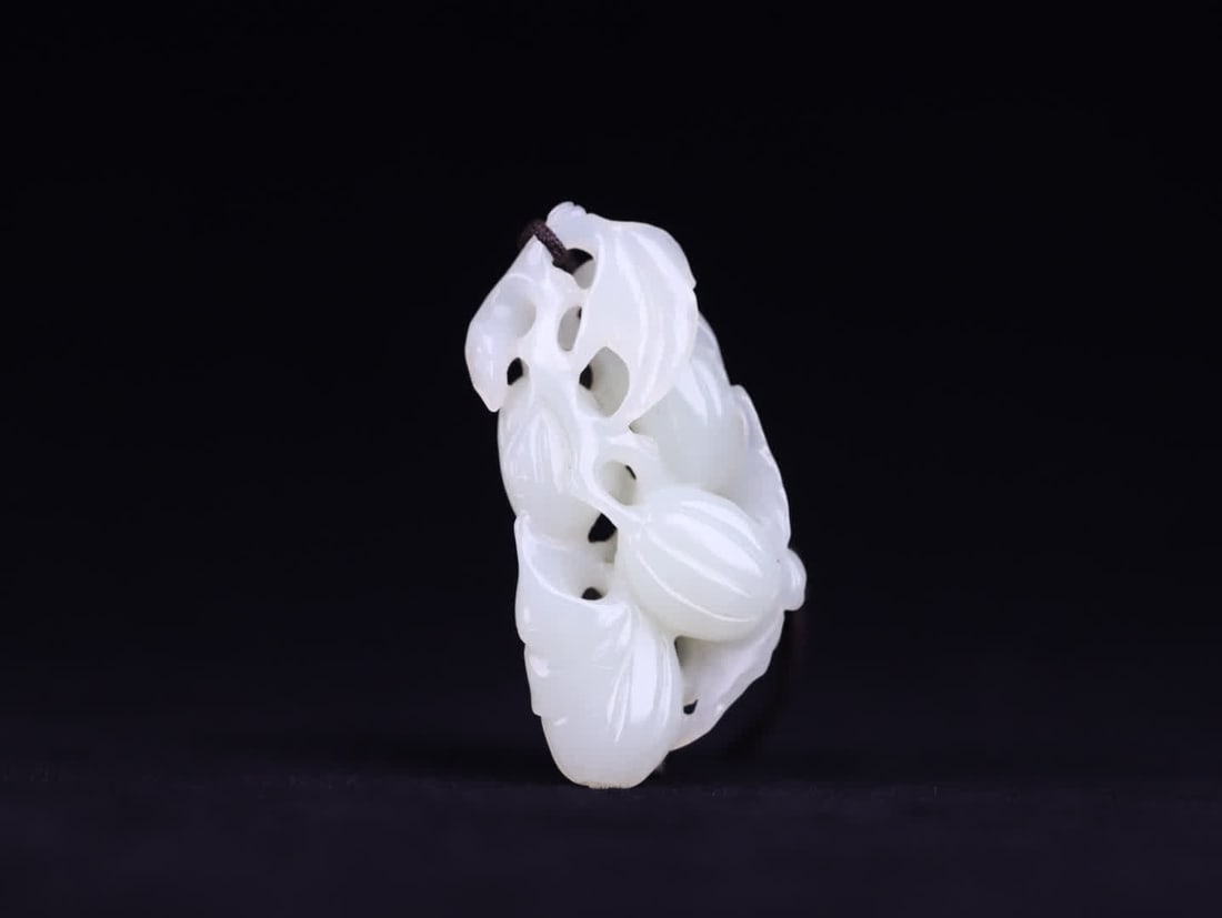A Qing dynasty old Hetian jade carved piece of Fugua (1 of 9)