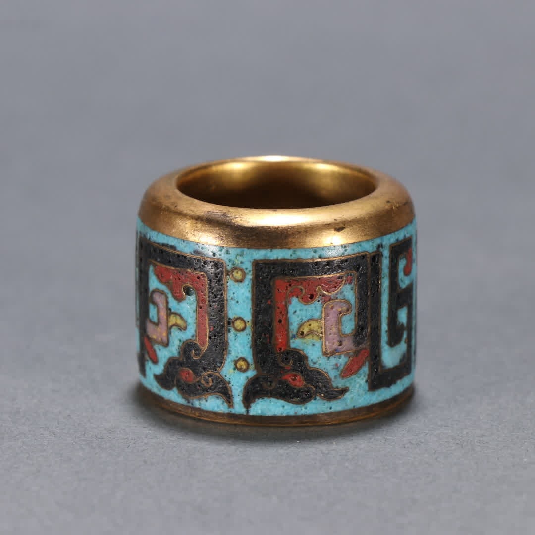 A copper gilt cloisonne thumb ring - 7