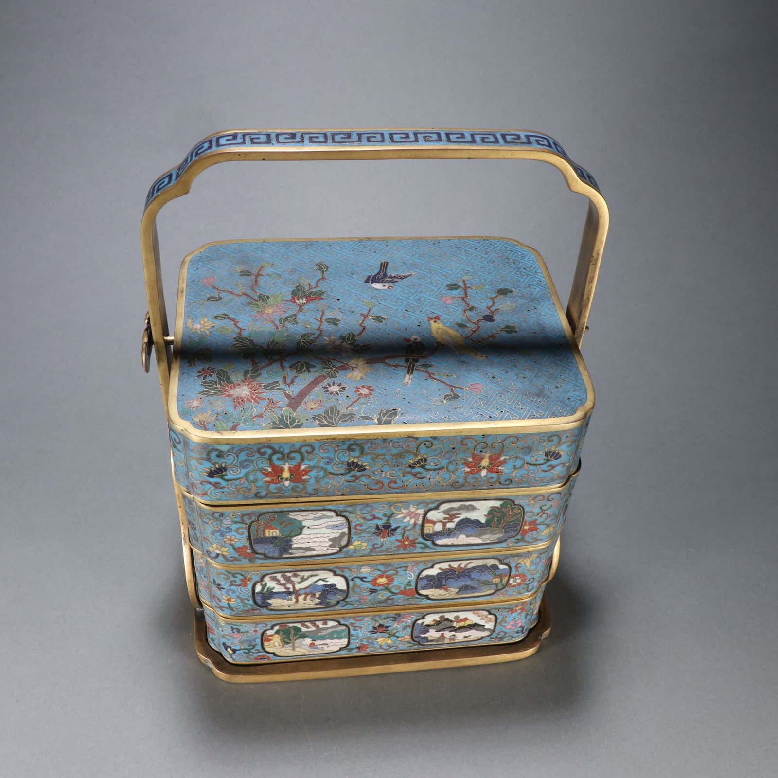 A Qing Dynasty copper gilt cloisonne food box with floral and bird patterns: Qing Dynasty gilt bronze cloisonne bird and flower food box SIZE: H:25.5cm W:19.2cm W:4072g (The Dimensions Of All Batches Are Manually Measured.If You Need More Detailed Information, Please Contact