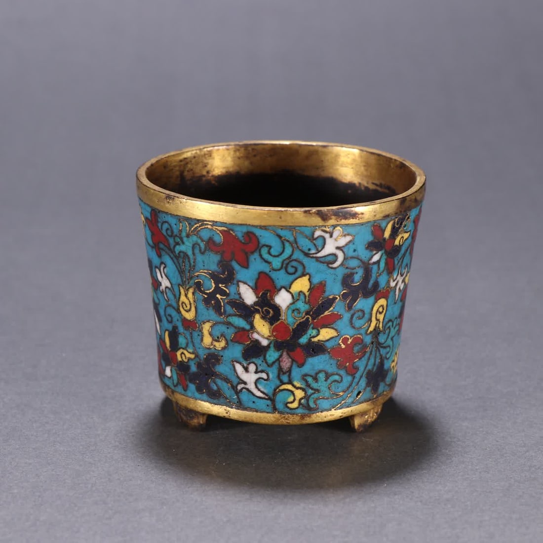 A Qing Dynasty bronze burner with gilt cloisonne floral patterns: Qing Dynasty bronze gilt cloisonne floral incense burner SIZE: H:6cm W:6.8cm W:104.2g (The Dimensions Of All Batches Are Manually Measured.If You Need More Detailed Information, Please Contact Our Cus