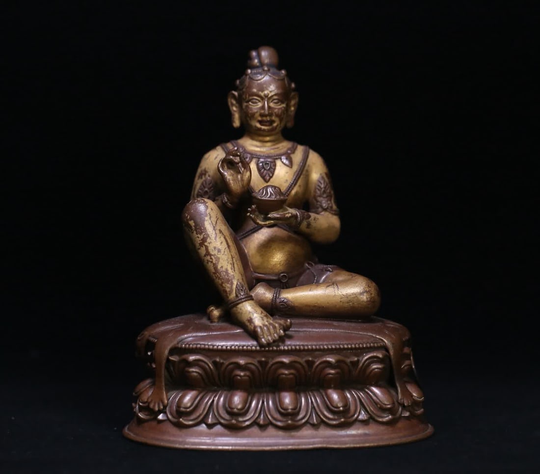 An 18th-century gilt bronze statue of a great accomplished figure in Tibetan Buddhism (1 of 10)