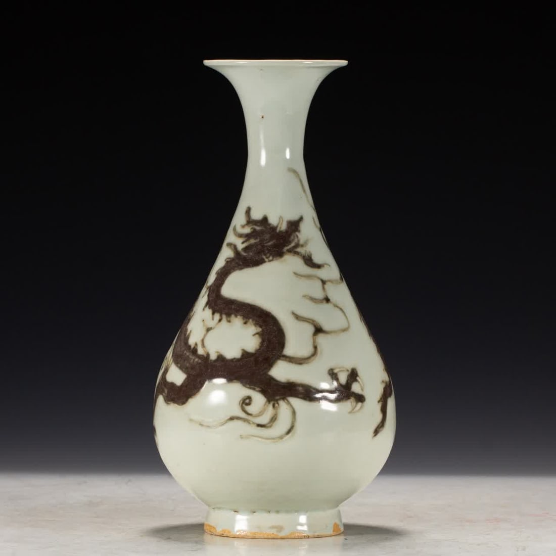 One Ming Dynasty underglaze red dragon pattern vase: Ming Dynasty underglaze red dragon patterned vase SIZE: L:11.5cm W:11.5cm H:23cm W:570g (The Dimensions Of All Batches Are Manually Measured.If You Need More Detailed Information, Please Contact Our C