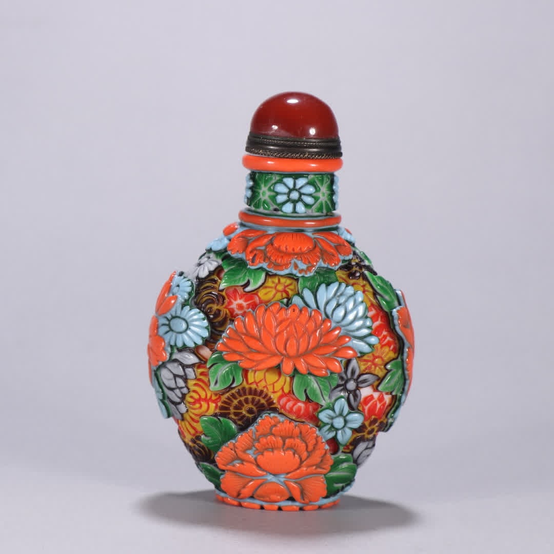 A Qing Dynasty material snuff bottle with a set body and floral patterns: Qing Dynasty Liaoqi Floral Pattern Snuff Bottle SIZE: H:9.4cm W:6.1cm W:120.6g (The Dimensions Of All Batches Are Manually Measured.If You Need More Detailed Information, Please Contact Our Customer