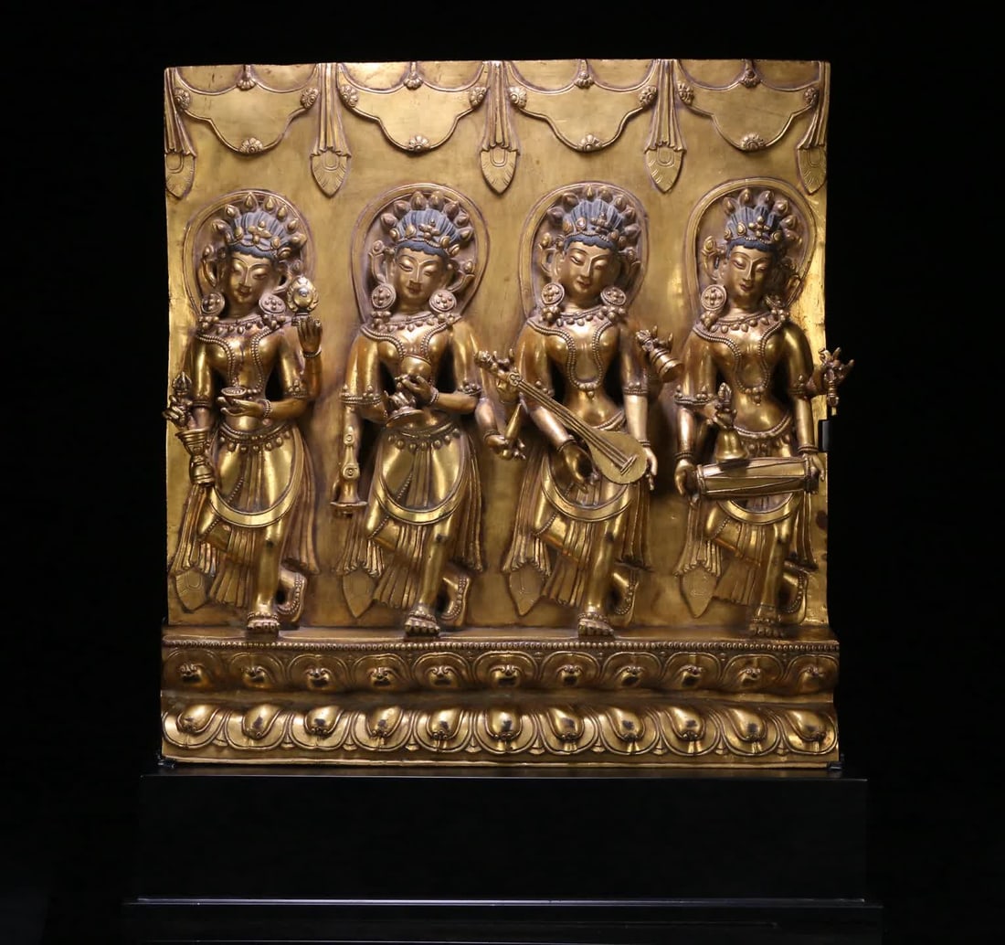 A 14th-century Tibetan Buddhist bronze gilt relief of the Four Offerings Celestial Maiden in the (1 of 14)