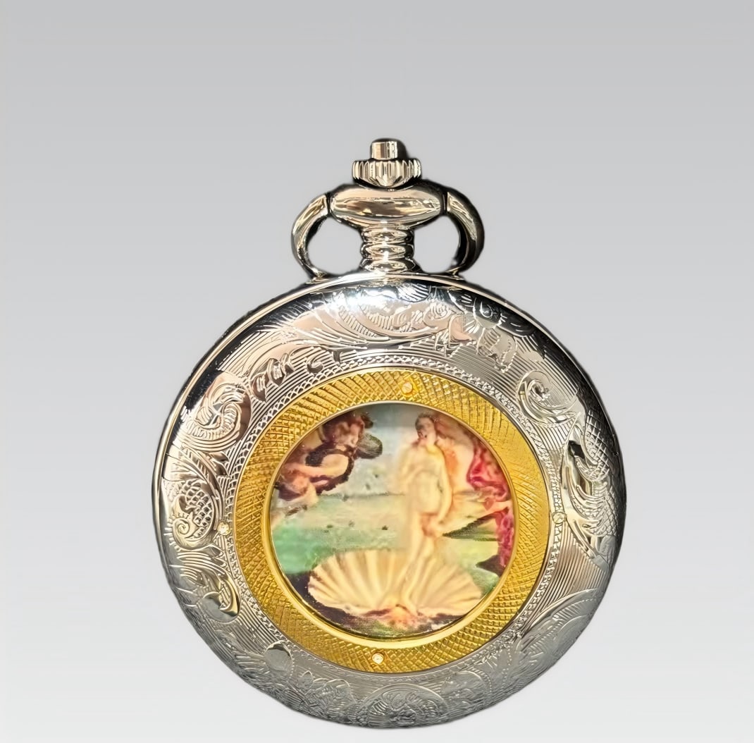A gilded pocket watch by Botticelli artistry: A Gilded Illuminated Wallet Watch by Botticelli SIZE: D: Approximately 50mm (The Dimensions Of All Batches Are Manually Measured.If You Need More Detailed Information, Please Contact Our Customer