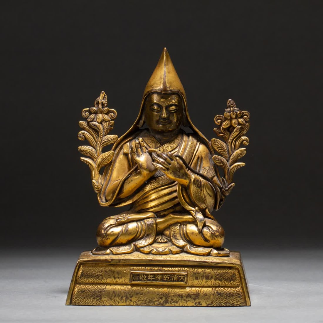 A Qing Dynasty gilt bronze Buddha statue: A gilt bronze Buddha statue from the Qing Dynasty SIZE: L:12cm W:7.5cm H:17cm W:2190g (The Dimensions Of All Batches Are Manually Measured.If You Need More Detailed Information, Please Contact Our