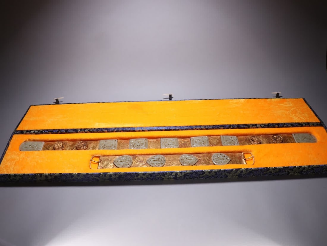 A set of Liao bronze gilt inlaid Hetian jade belts: Liao dynasty: A gilded copper belt inlaid with Hetian jade SIZE: L:99.5cm W:4.9cm Total W:700g (The Dimensions Of All Batches Are Manually Measured.If You Need More Detailed Information, Please