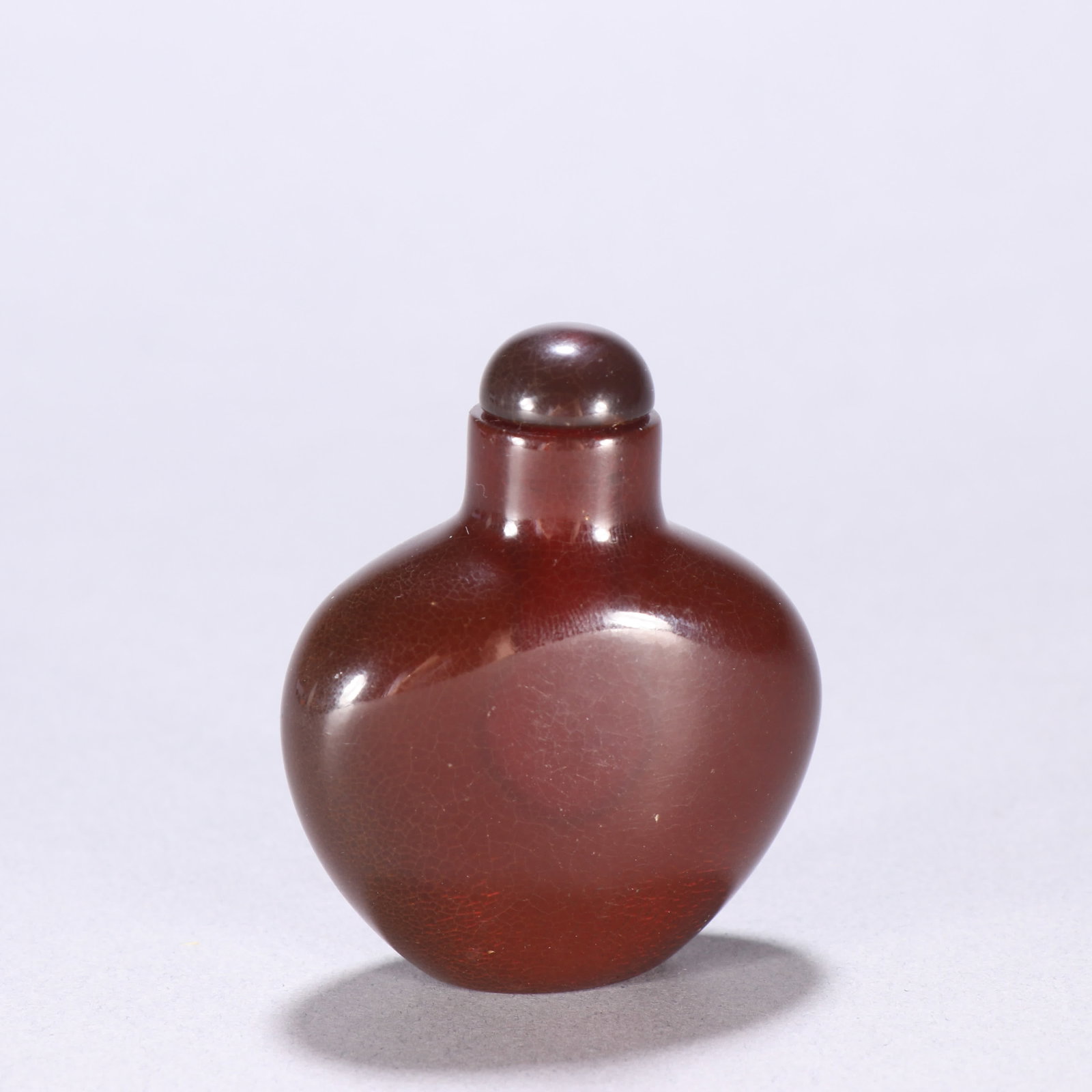 A Qing Dynasty amber snuff bottle: Qing Dynasty Amber Snuff Bottle SIZE: H:5.2cm W:4.9cm W:35.7g (The Dimensions Of All Batches Are Manually Measured.If You Need More Detailed Information, Please Contact Our Customer Service Before