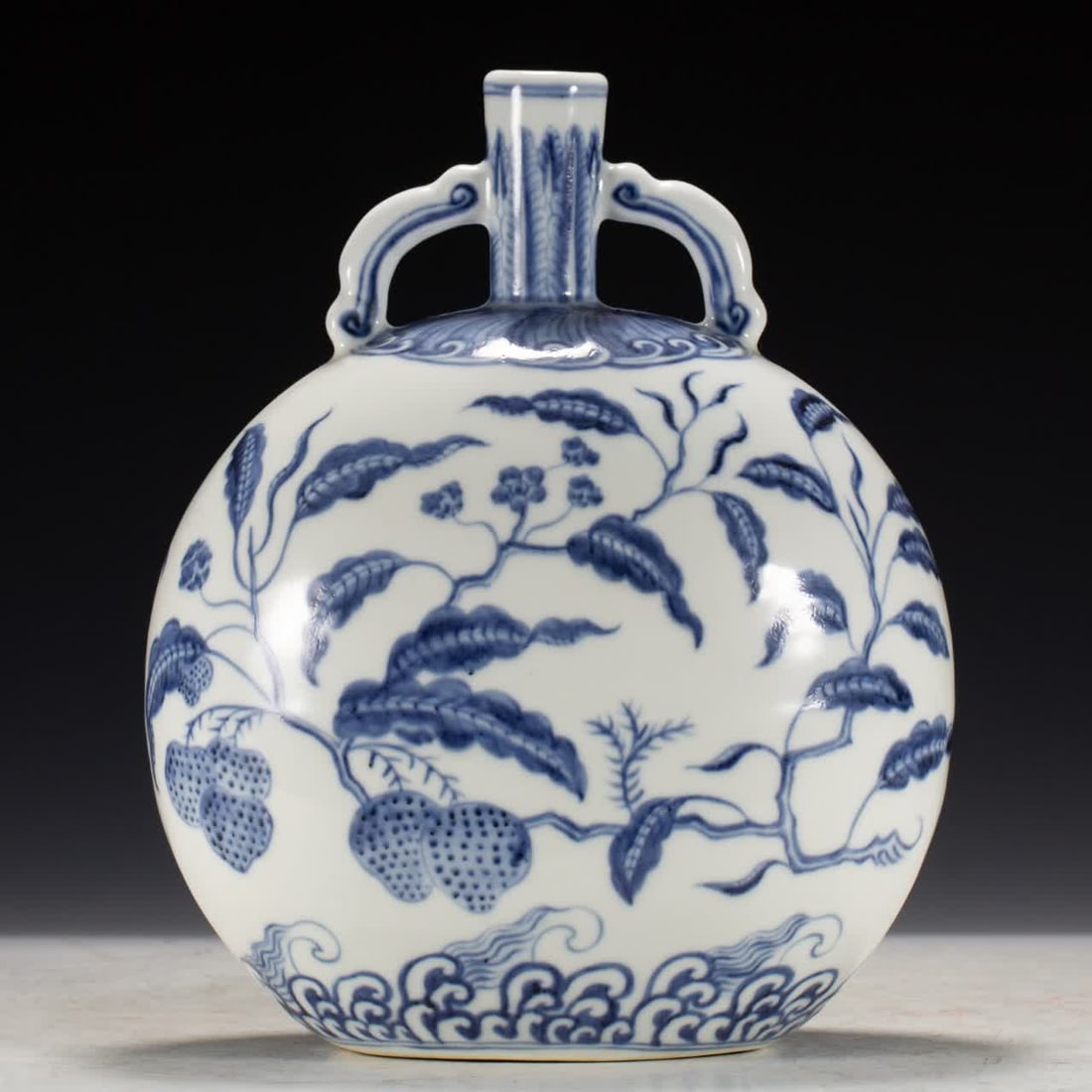 A Ming Dynasty blue-and-white moon-embracing vase: Ming dynasty blue-and-white moon-embracing vase SIZE: L:21cm W:13cm H:26cm W:2150g (The Dimensions Of All Batches Are Manually Measured.If You Need More Detailed Information, Please Contact Our
