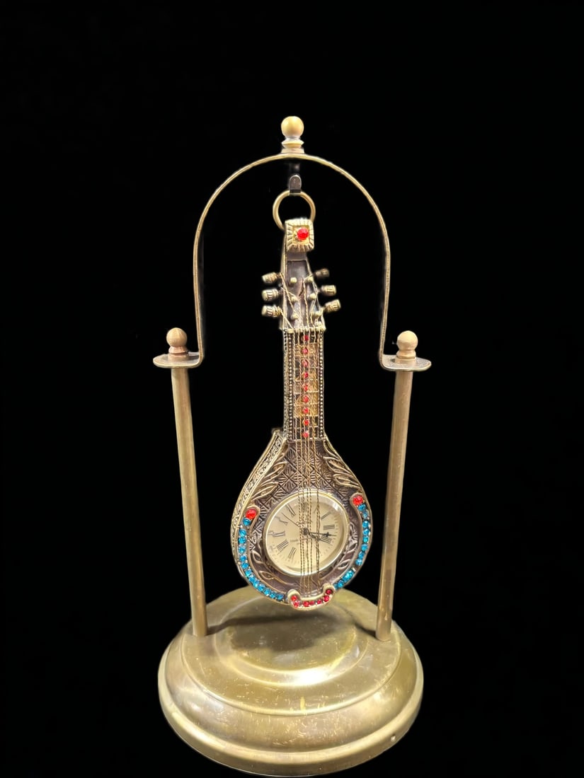 A late Qing dynasty copper pipa mechanical clock: Late Qing dynasty copper pipa mechanical clocks SIZE: D:5.5cm (The Dimensions Of All Batches Are Manually Measured.If You Need More Detailed Information, Please Contact Our Customer Service Before
