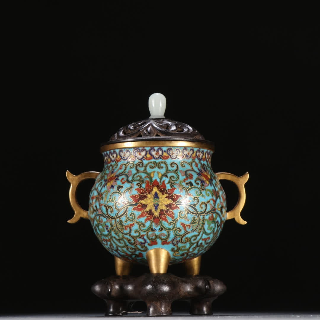 A Qing Dynasty copper gilt cloisonne with lotus pattern double-handled aroma burner: Qing Dynasty Gilt cloisonne Double-Handled Incense Burner with Branch Lotus Pattern SIZE: H:13.5cm W:10.5cm W:370g (The Dimensions Of All Batches Are Manually Measured.If You Need More Detailed
