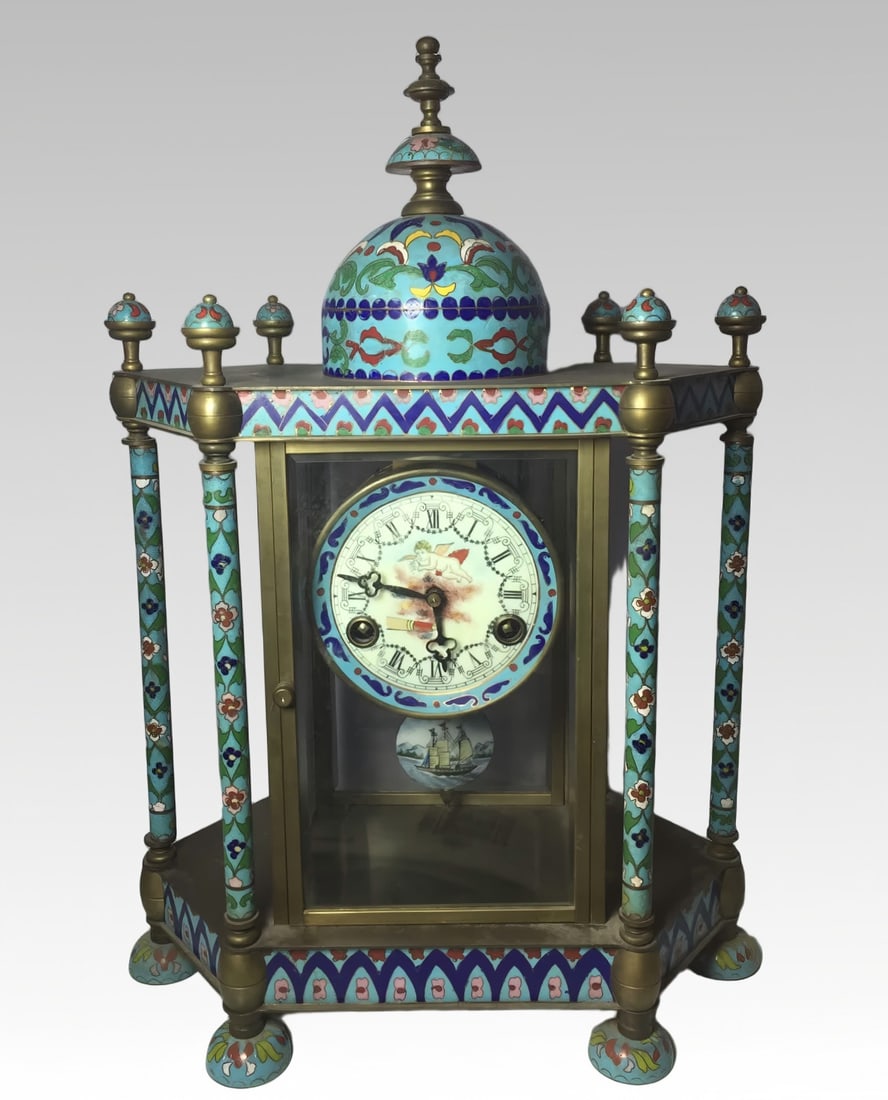 A late Qing dynasty bronze-bodied cloisonne enamel hand clock: Late Qing dynasty copper-bodied cloisonne enamel hand clock SIZE: 320x180x465mm7.4kg (The Dimensions Of All Batches Are Manually Measured.If You Need More Detailed Information, Please Contact Our