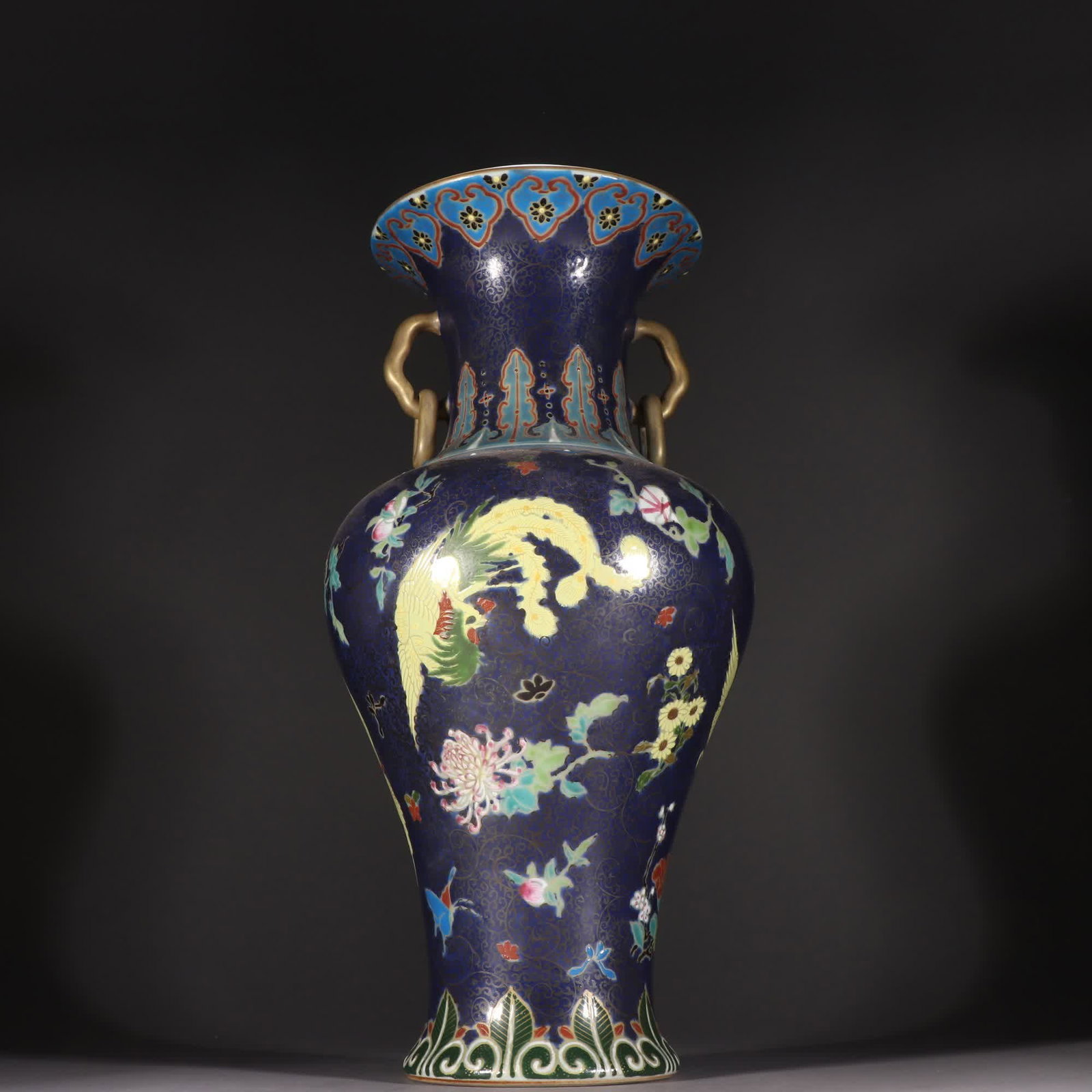 A Qing Dynasty porcelain vase with painted enamel phoenix patterns and double handles: Qing Dynasty porcelain body enamel phoenix pattern double-handled appreciation vase SIZE: H:36.5cm W:18cm (The Dimensions Of All Batches Are Manually Measured.If You Need More Detailed Information,