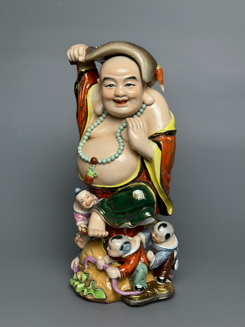 An Exquisite Iron-Red Painted Gold Statue of Arhat: An Exquisite Iron-Red Painted Gold Statue of Arhat the Republic of China Size:26cmx12.3cm (The Dimensions Of All Batches Are Manually Measured.If You Need More Detailed Information, Please Contact Our