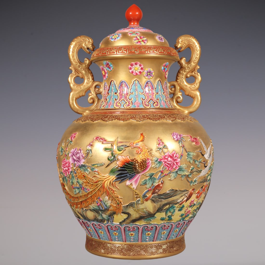 An Exquisite Enamel Flower and Bird Pattern Double-Ears Jar: An Exquisite Enamel Flower and Bird Pattern Double-Ears Jar Qing Dynasty, China Qianlong Six-character Mark Size:33cmx20cm (The Dimensions Of All Batches Are Manually Measured.If You Need More