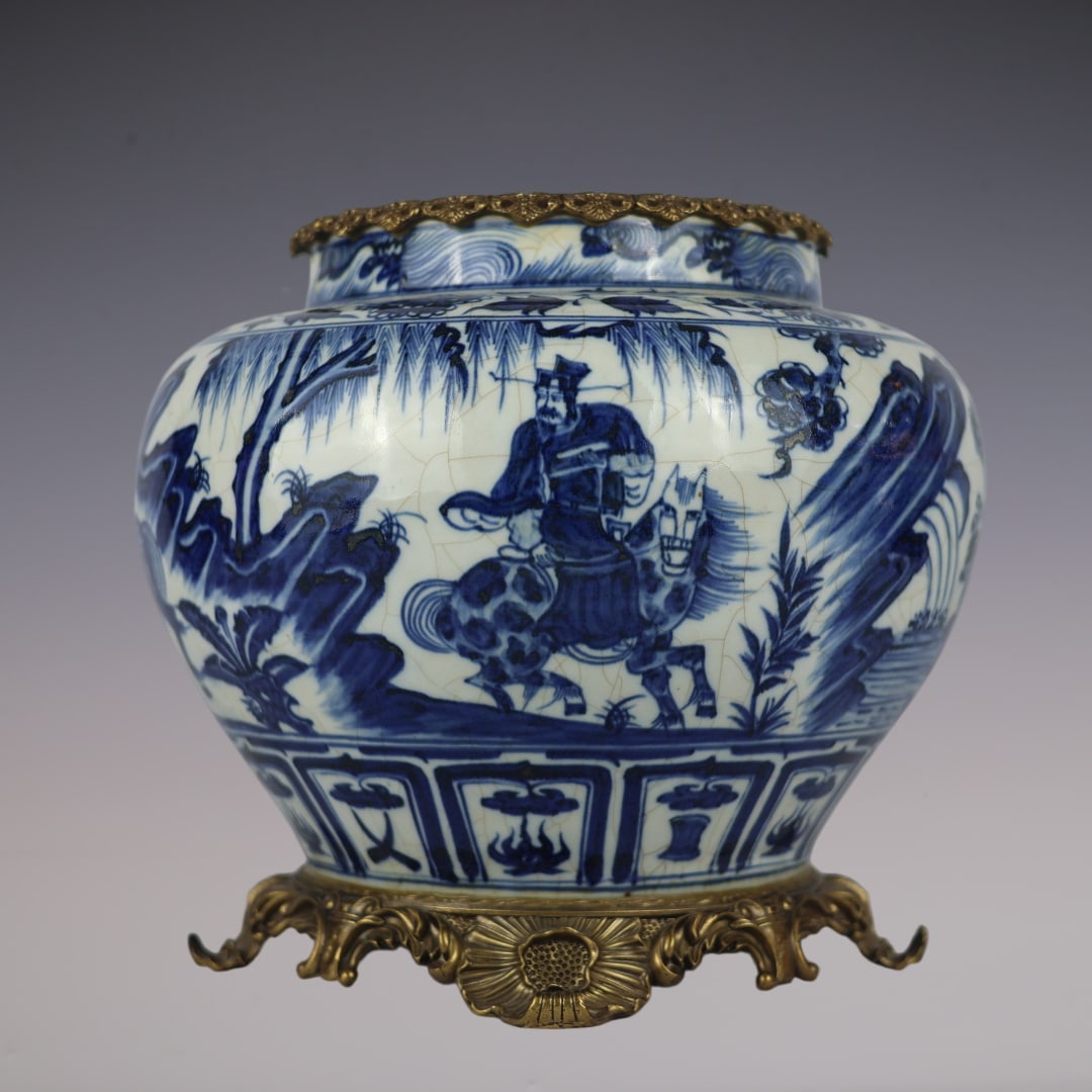 An Exquisite Blue and White Underglaze-Red Inlaid Bronze Character and Story Pattern Jar: An Exquisite Blue and White Underglaze-Red Inlaid Bronze Character and Story Pattern Jar Yuan Dynasty, China Size:33cmx30cm (The Dimensions Of All Batches Are Manually Measured.If You Need More
