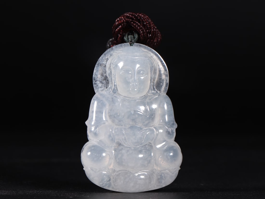 An Exquisite Jadeite Statue of Avalokitesvara Pattern Pendant: An Exquisite Jadeite Statue of Avalokitesvara Pattern Pendant Qing Dynasty, China Size:5.5cmx3.7cmx0.9cm Weight:31g (The Dimensions Of All Batches Are Manually Measured.If You Need More Detailed
