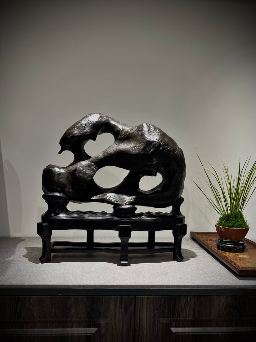 An Exquisite Taihu Stone Ornament: An Exquisite Taihu Stone Ornament Qing Dynasty, China Size:46cmx48cmx18cm (The Dimensions Of All Batches Are Manually Measured.If You Need More Detailed Information, Please Contact Our Customer