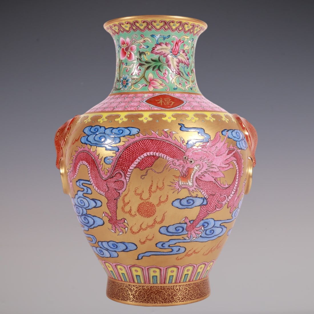 An Exquisite Enamel Lotus Pattern Dragon Pattern Double-Ears Vase: An Exquisite Enamel Lotus Pattern Dragon Pattern Double-Ears Vase Qing Dynasty, China Qianlong Six-character Mark Size:18cmx11.5cm (The Dimensions Of All Batches Are Manually Measured.If You Need