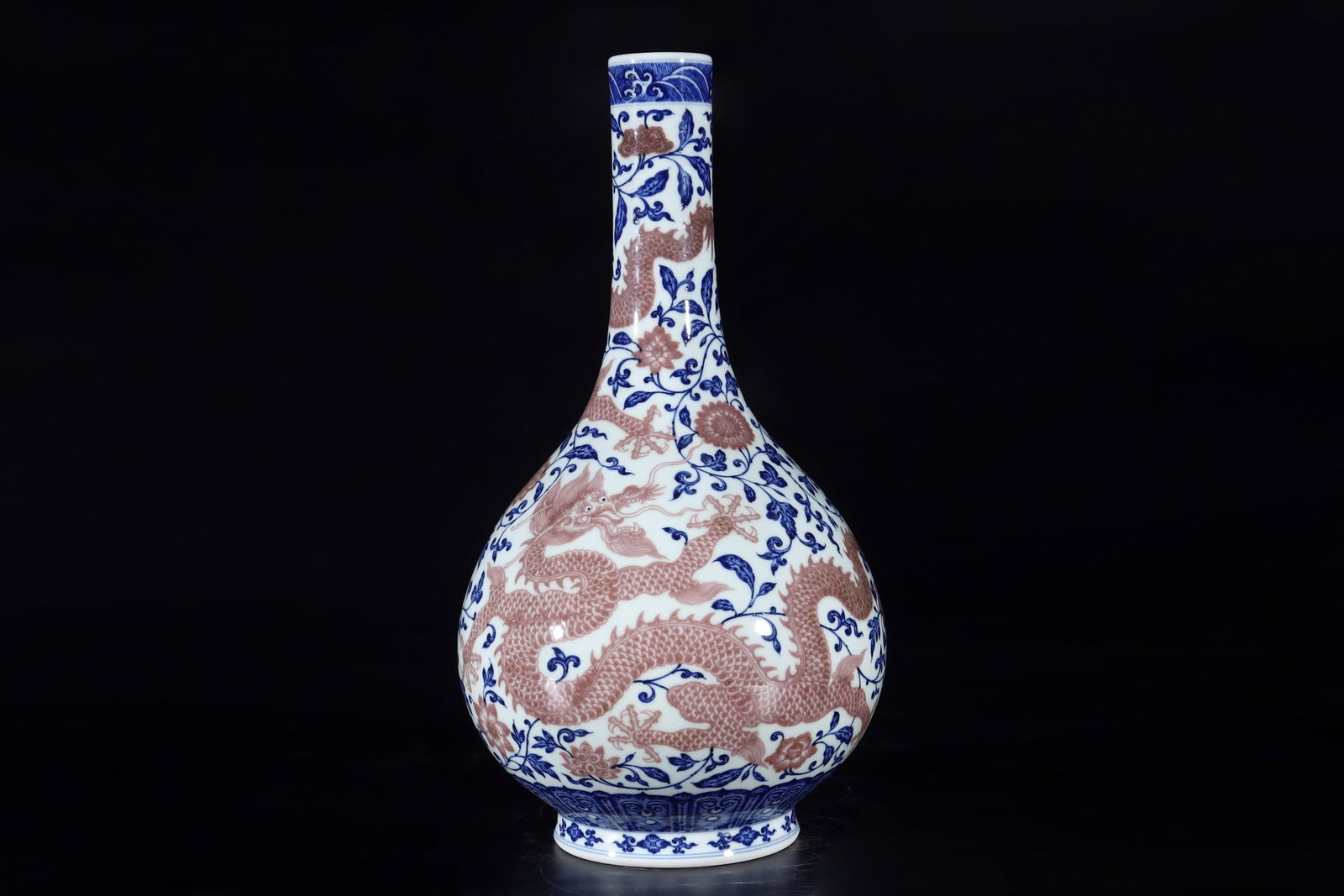 An Exquisite Blue and White Underglaze-Red Dragon Pattern Lotus Pattern Vase: An Exquisite Blue and White Underglaze-Red Dragon Pattern Lotus Pattern Vase Qing Dynasty, China Yongzheng Six-character Mark Size:37cmx20cm (The Dimensions Of All Batches Are Manually Measured.If You