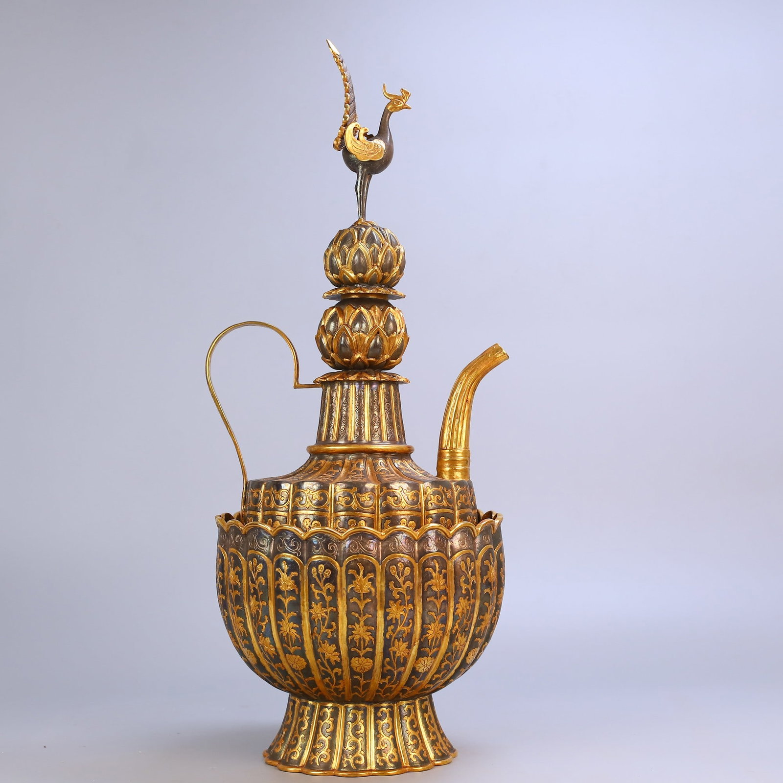 An Exquisite Gilt Bronze Flower Pattern Ewer: An Exquisite Gilt Bronze Flower Pattern Ewer Qing Dynasty, China Qianlong Four-character Mark Size:56cmx23cm Weight:3584g (The Dimensions Of All Batches Are Manually Measured.If You Need More Detailed