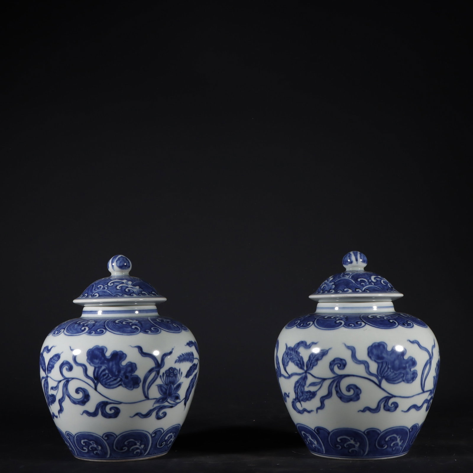 A Pair of Exquisite Blue and White Lotus Pattern Jar: A Pair of Exquisite Blue and White Lotus Pattern Jar Ming Dynasty, China Chenghua Six-character Mark Size:17cmx13cm (The Dimensions Of All Batches Are Manually Measured.If You Need More Detailed