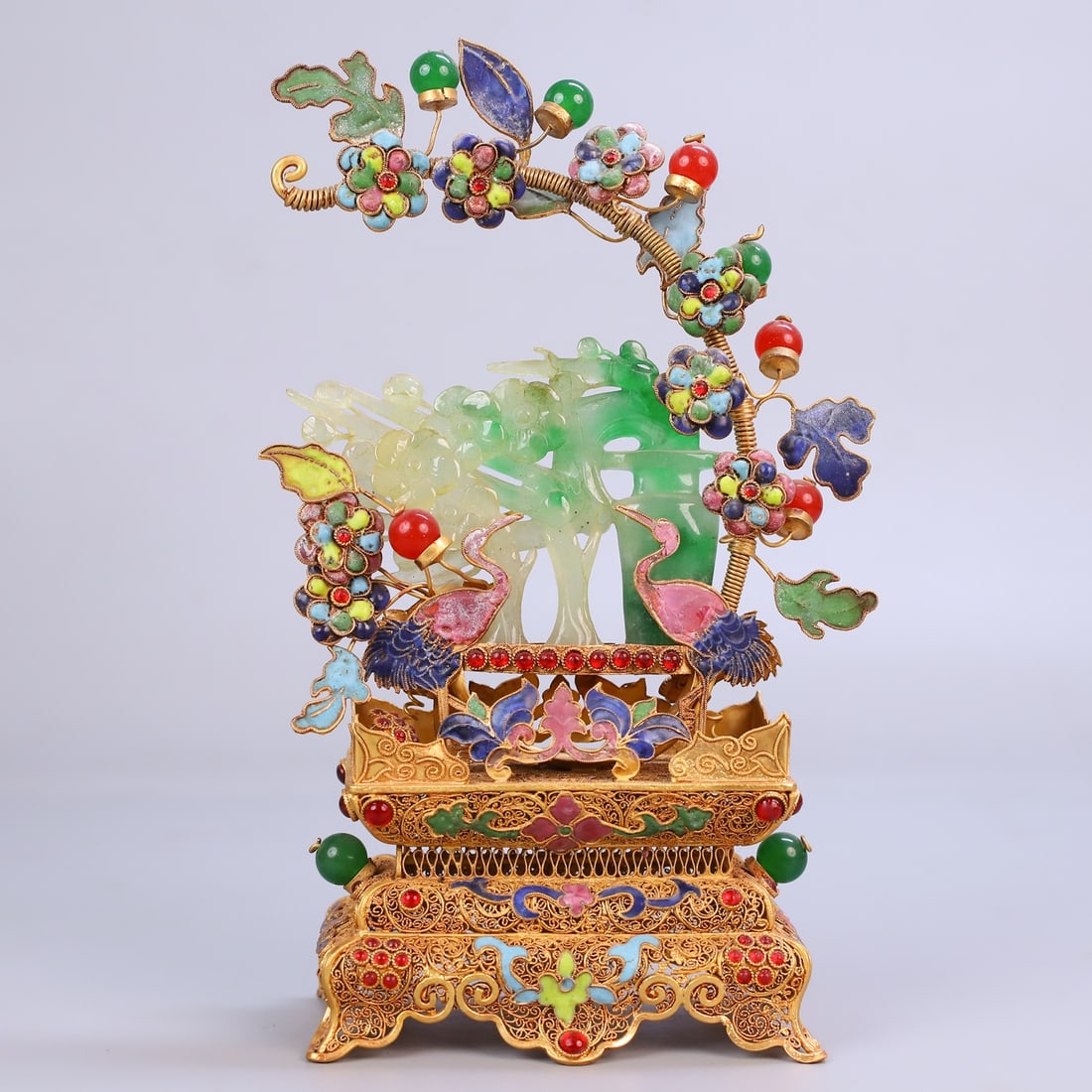 An Exquisite Gilt Bronze Inlaid Jadeite Flower and Bird Pattern Ornament: An Exquisite Gilt Bronze Inlaid Jadeite Flower and Bird Pattern Ornament Qing Dynasty, China Qianlong Four-character Mark Size:23.6cmx15cmx73cm Weight:480g (The Dimensions Of All Batches Are Manually