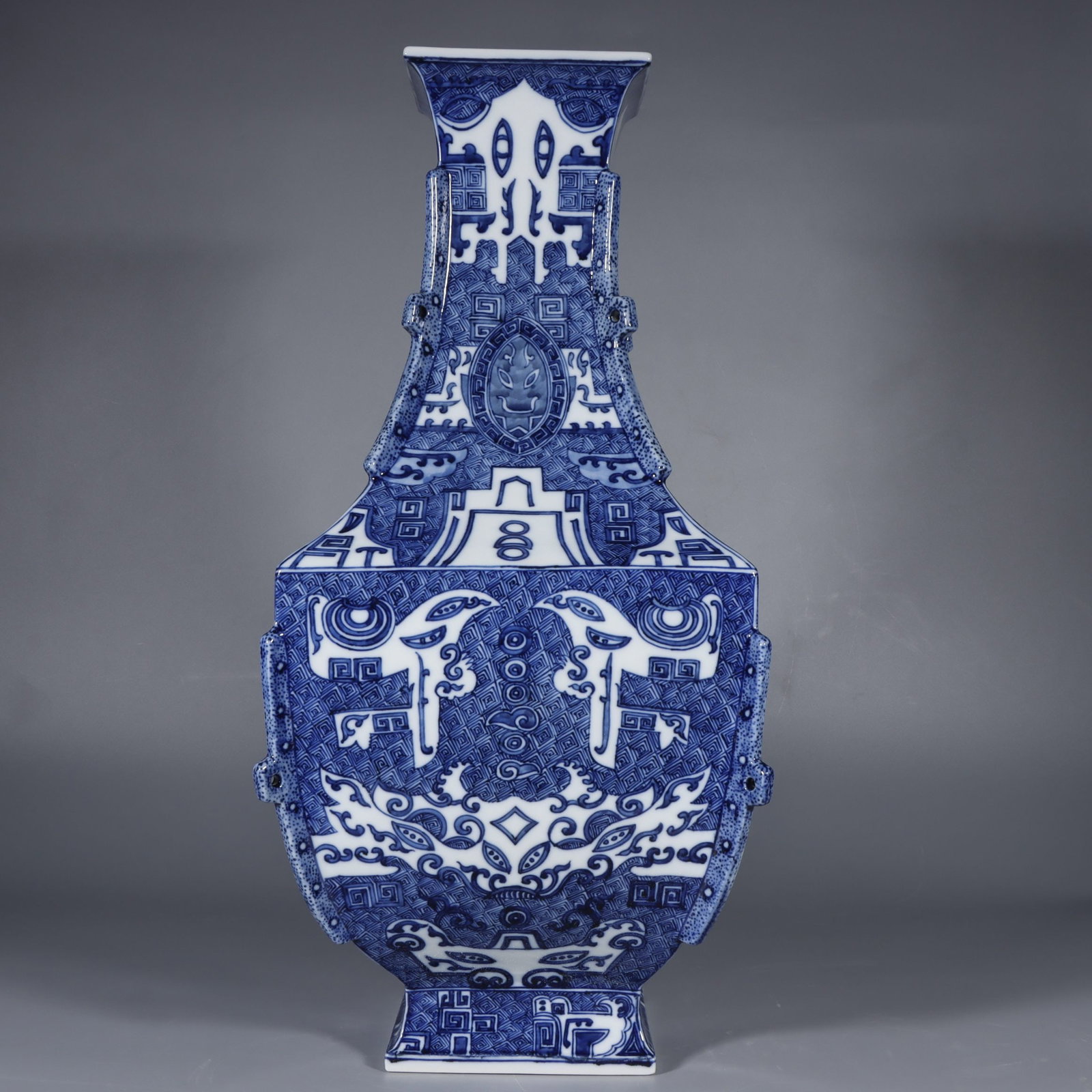 An Exquisite Blue and White Beast-Face Pattern Vase: An Exquisite Blue and White Beast-Face Pattern Vase Qing Dynasty, China Qianlong Six-character Mark Size:51cmx22.5cm (The Dimensions Of All Batches Are Manually Measured.If You Need More Detailed