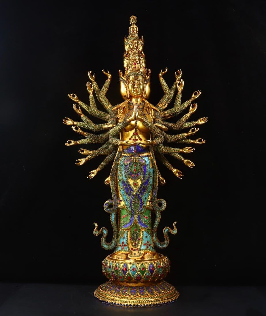 An Exquisite Gilt Bronze Inlaid Gems Statue of Thousand-hand Guanyin: An Exquisite Gilt Bronze Inlaid Gems Statue of Thousand-hand Guanyin Qing Dynasty, China Qianlong Four-character Mark Size: 77cmx39cmx22cm Weight:12020g (The Dimensions Of All Batches Are Manually