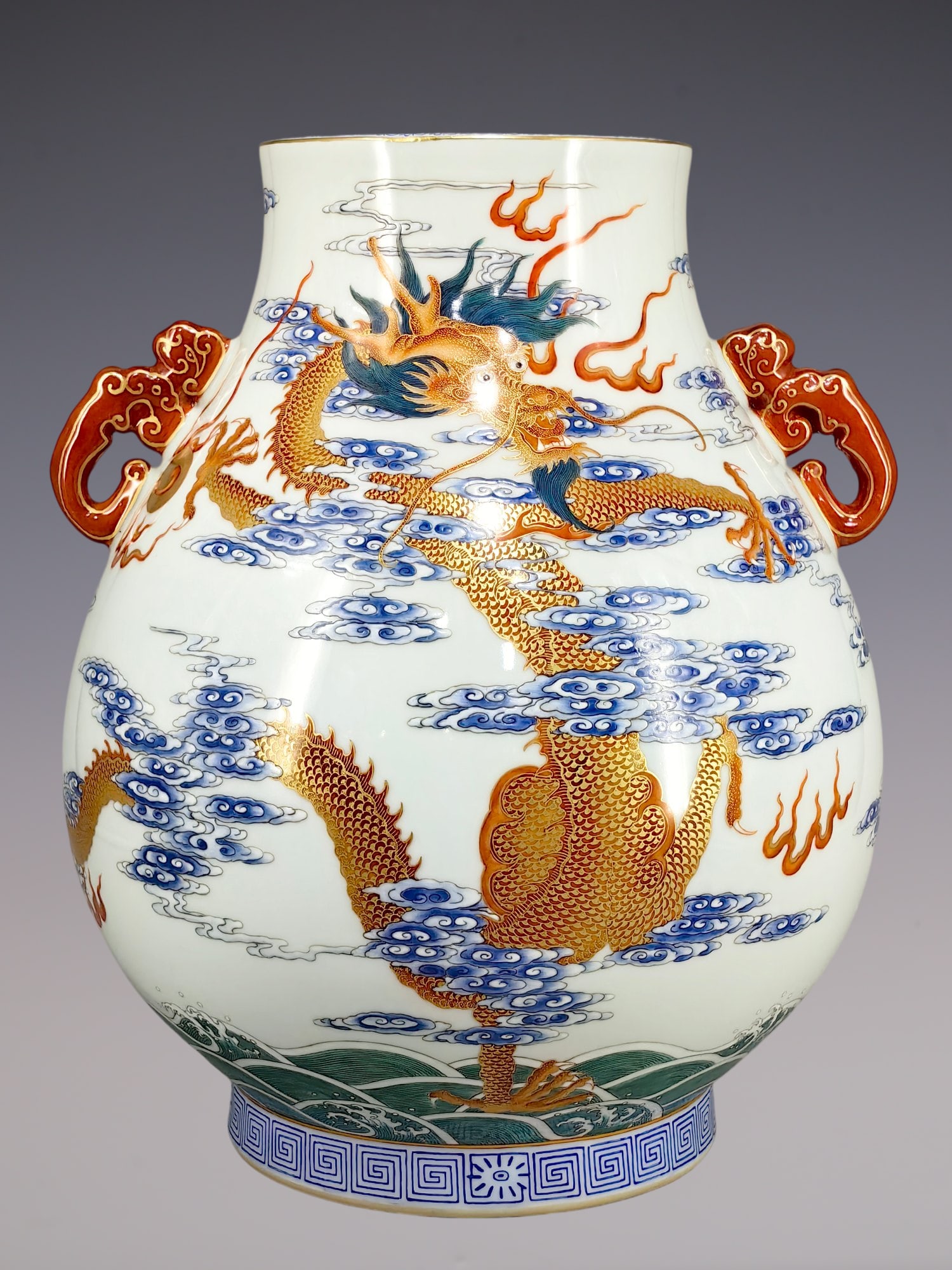 An Exquisite Famille-Rose Dragon and Phoenix Pattern Seawater Pattern Double-Ears Vase: An Exquisite Famille-Rose Dragon and Phoenix Pattern Seawater Pattern Double-Ears Vase Qing Dynasty, China Qianlong Six-character Mark Size:37cmx33cm (The Dimensions Of All Batches Are Manually