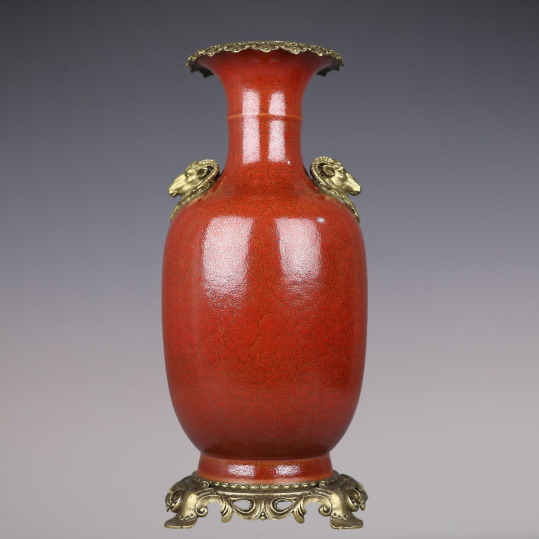 An Exquisite Red Glazed Inlaid Bronze Double-Ears Vase: An Exquisite Red Glazed Inlaid Bronze Double-Ears Vase Qing Dynasty, China Kangxi Six-character Mark Size:44.5cmx19cm (The Dimensions Of All Batches Are Manually Measured.If You Need More Detailed