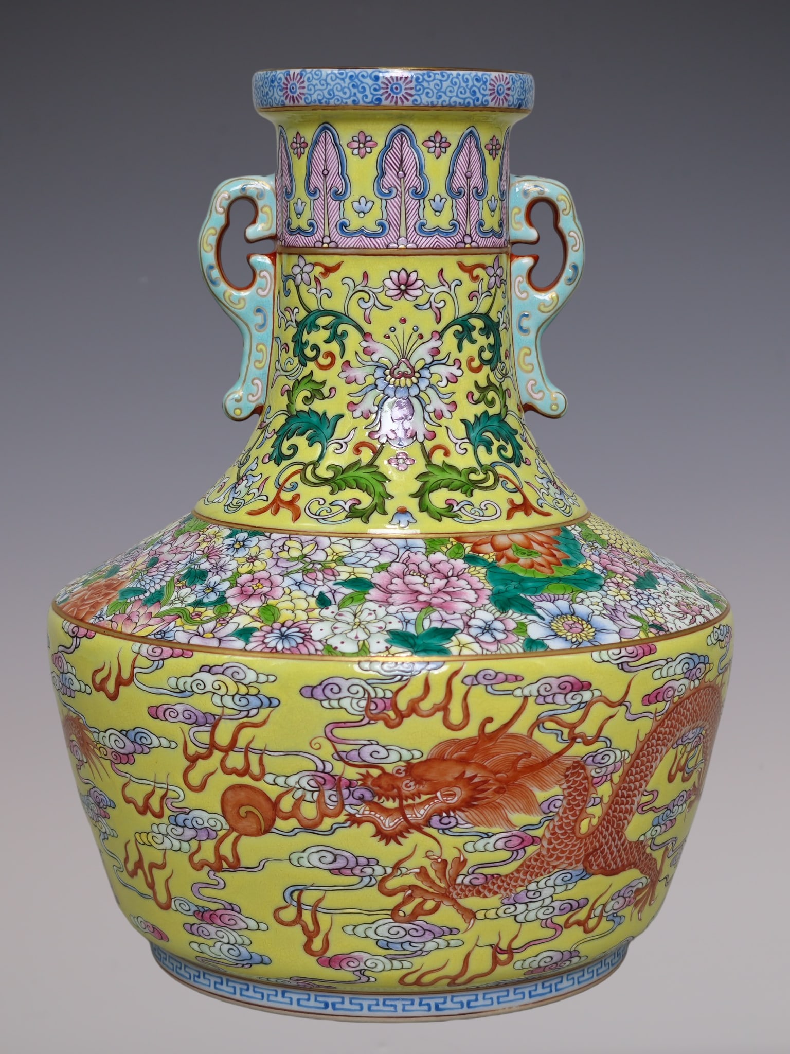 An Exquisite Famille-Rose Lotus Pattern Dragon Pattern Double-Ears Vase: An Exquisite Famille-Rose Lotus Pattern Dragon Pattern Double-Ears Vase Qing Dynasty, China Qianlong Six-character Mark Size:26cmx21cm (The Dimensions Of All Batches Are Manually Measured.If You Need