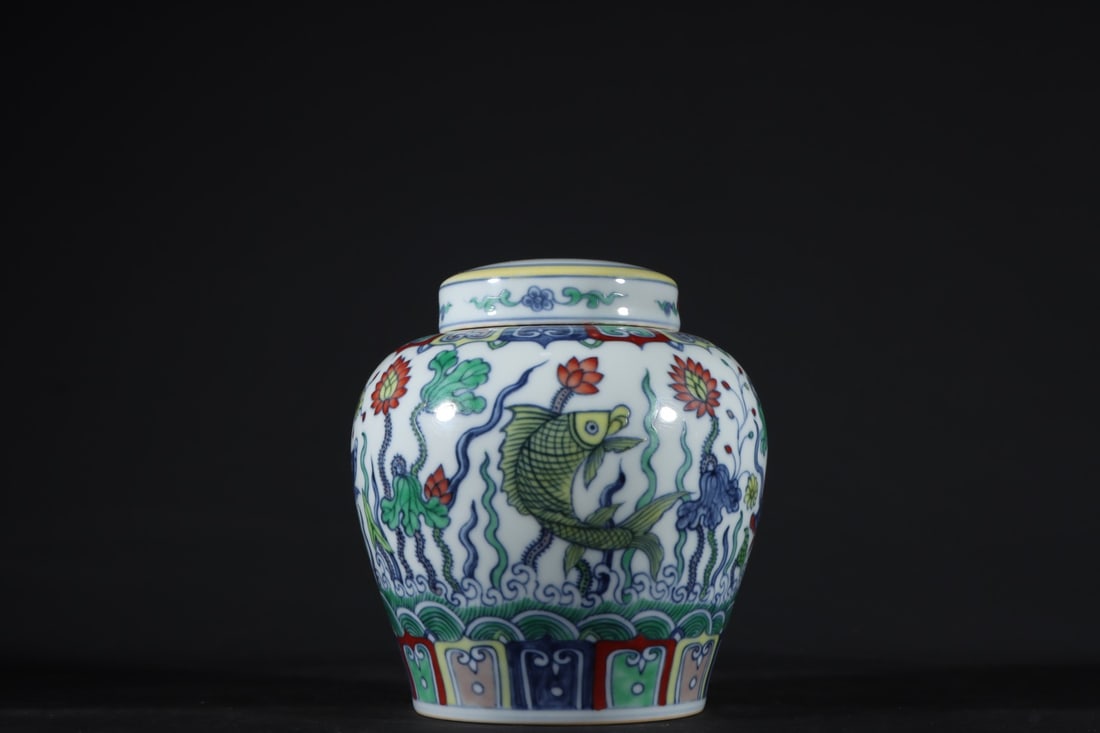 An Exquisite Doucai Fish and Lotus Pattern Jar: An Exquisite Doucai Fish and Lotus Pattern Jar Ming Dynasty, China Size:13.5cmx12.5cm (The Dimensions Of All Batches Are Manually Measured.If You Need More Detailed Information, Please Contact Our