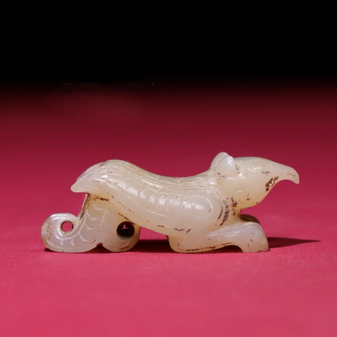 An Exquisite White Jade Phoenix Pendant: An Exquisite White Jade Phoenix Pendant S.Zhou , China Size:5.8cmx2.1cmx2.5cm Weight:31g (The Dimensions Of All Batches Are Manually Measured.If You Need More Detailed Information, Please Contact Our