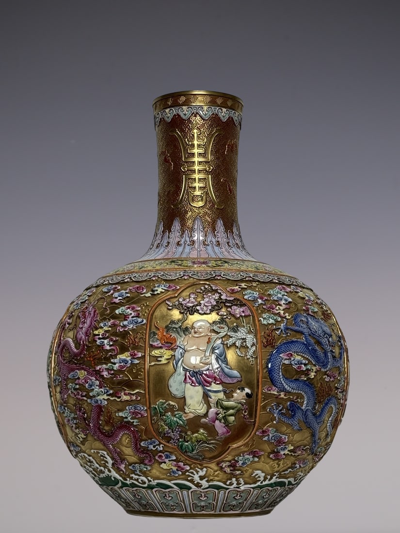 An Exquisite Famille-Rose Seawater Pattern Dragon Pattern Bats and Peach Pattern Character and Story: An Exquisite Famille-Rose Seawater Pattern Dragon Pattern Bats and Peach Pattern Character and Story Pattern Lotus Pattern Vase Qing Dynasty, China Qianlong Six-character Mark Size:55cmx41cm (The