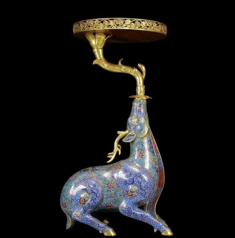 An Exquisite Cloisonne Flower Pattern Deer-Shaped Candlestick: An Exquisite Cloisonne Flower Pattern Deer-Shaped Candlestick Qing Dynasty, China Qianlong Four-character Mark Size:88cmx47cm Weight:28kg (The Dimensions Of All Batches Are Manually Measured.If You