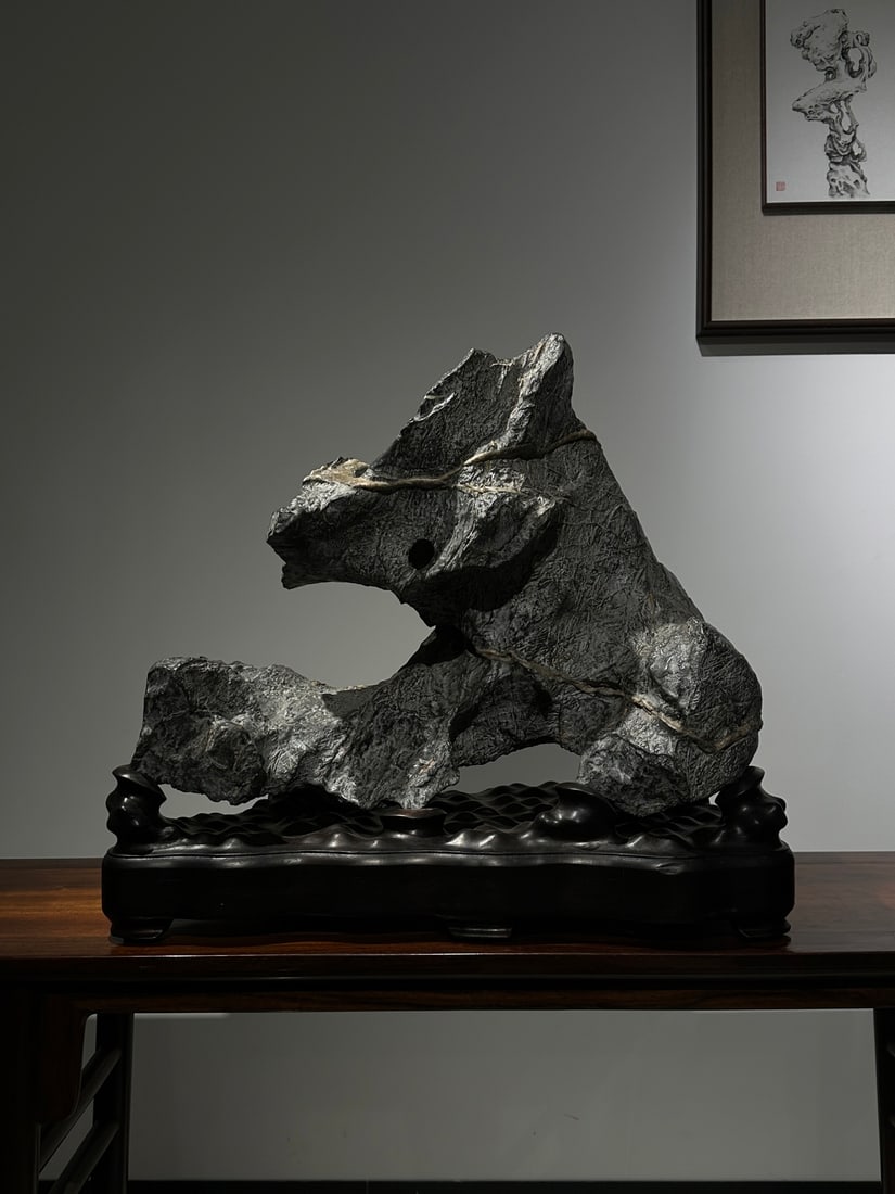 An Exquisite Lingbi Stone Ornament: An Exquisite Lingbi Stone Ornament Qing Dynasty, China Size:66cmx56cmx36cm (The Dimensions Of All Batches Are Manually Measured.If You Need More Detailed Information, Please Contact Our Customer