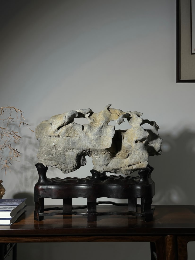 An Exquisite Taihu Stone Ornament: An Exquisite Taihu Stone Ornament Qing Dynasty, China Size:60cmx50cmx24cm (The Dimensions Of All Batches Are Manually Measured.If You Need More Detailed Information, Please Contact Our Customer