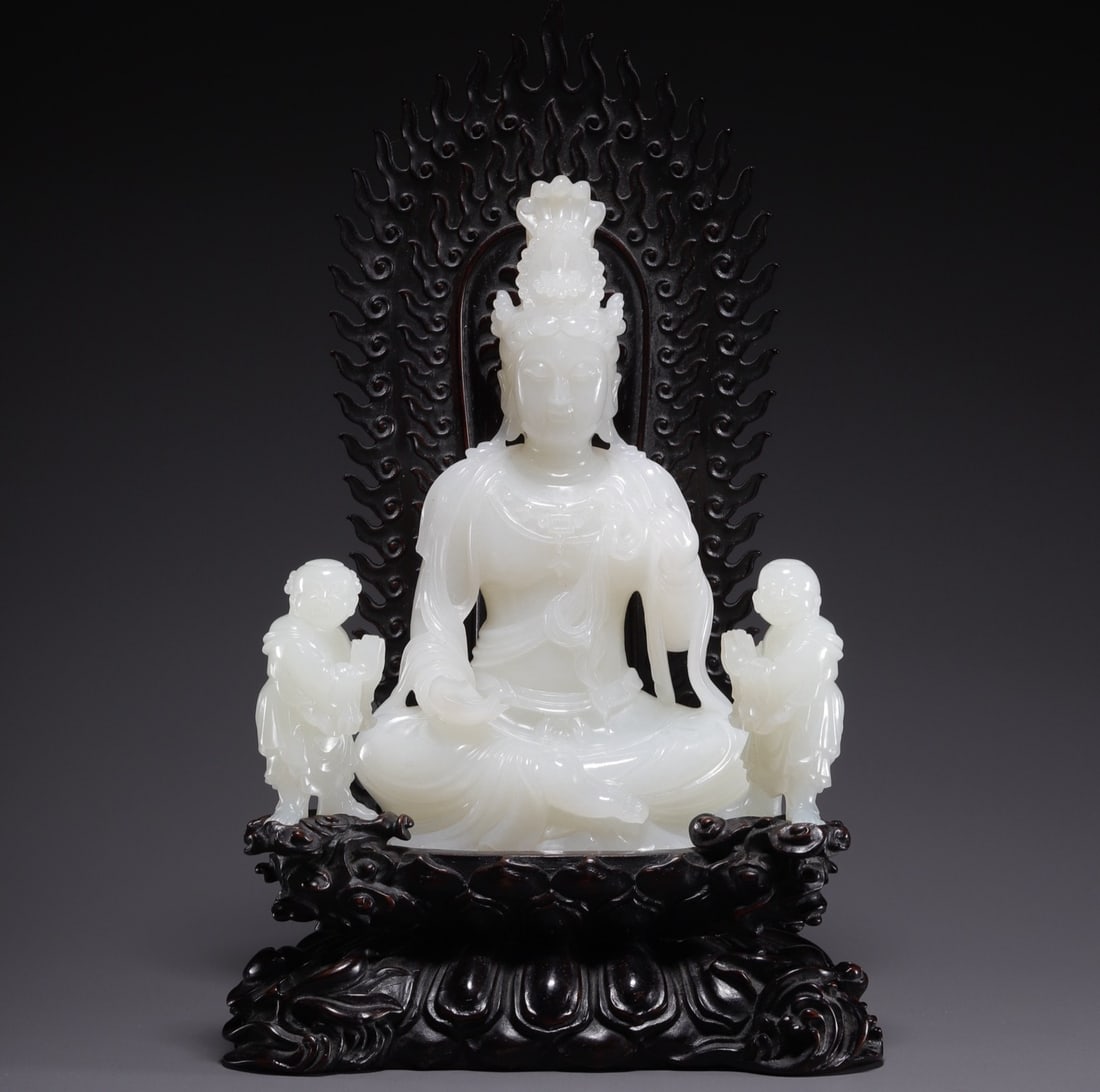 An Exquisite White Jade Statue of Avalokitesvara Ornament: An Exquisite White Jade Statue of Avalokitesvara Ornament Qing Dynasty, China Size:12.8cmx7.8cmx4.6cm Weight:328.2g Size:5.0cmx2.6cmx2.2cm Weight:56.5g (The Dimensions Of All Batches Are Manually