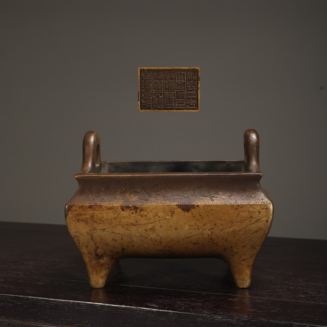 An Exquisite Bronze Double-Ears Censer: An Exquisite Bronze Double-Ears Censer Ming Dynasty, China Size:12.8cmx17.3cm Weight:3200g (The Dimensions Of All Batches Are Manually Measured.If You Need More Detailed Information, Please Contact