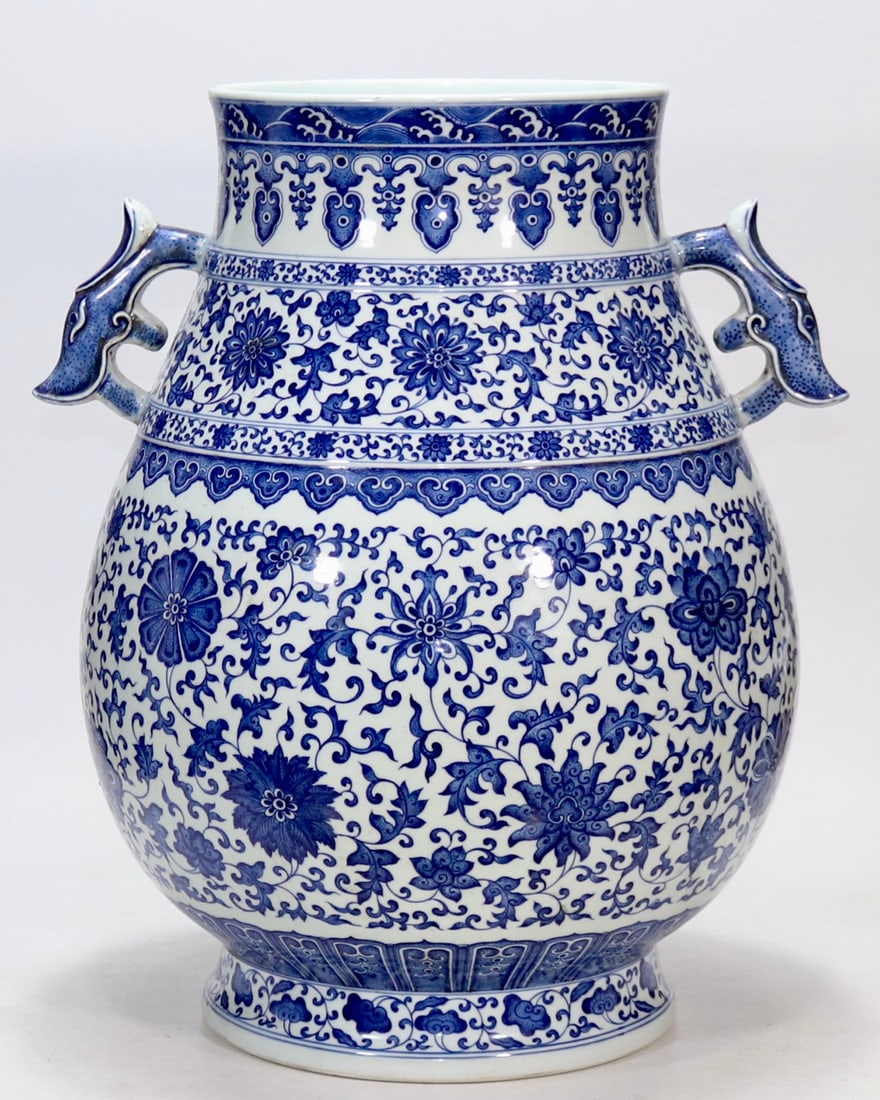 An Exquisite Blue and White Lotus Pattern Double-Ears Vase: An Exquisite Blue and White Lotus Pattern Double-Ears Vase Qing Dynasty, China Qianlong Six-character Mark Size:50.5cmx23.9cm (The Dimensions Of All Batches Are Manually Measured.If You Need More