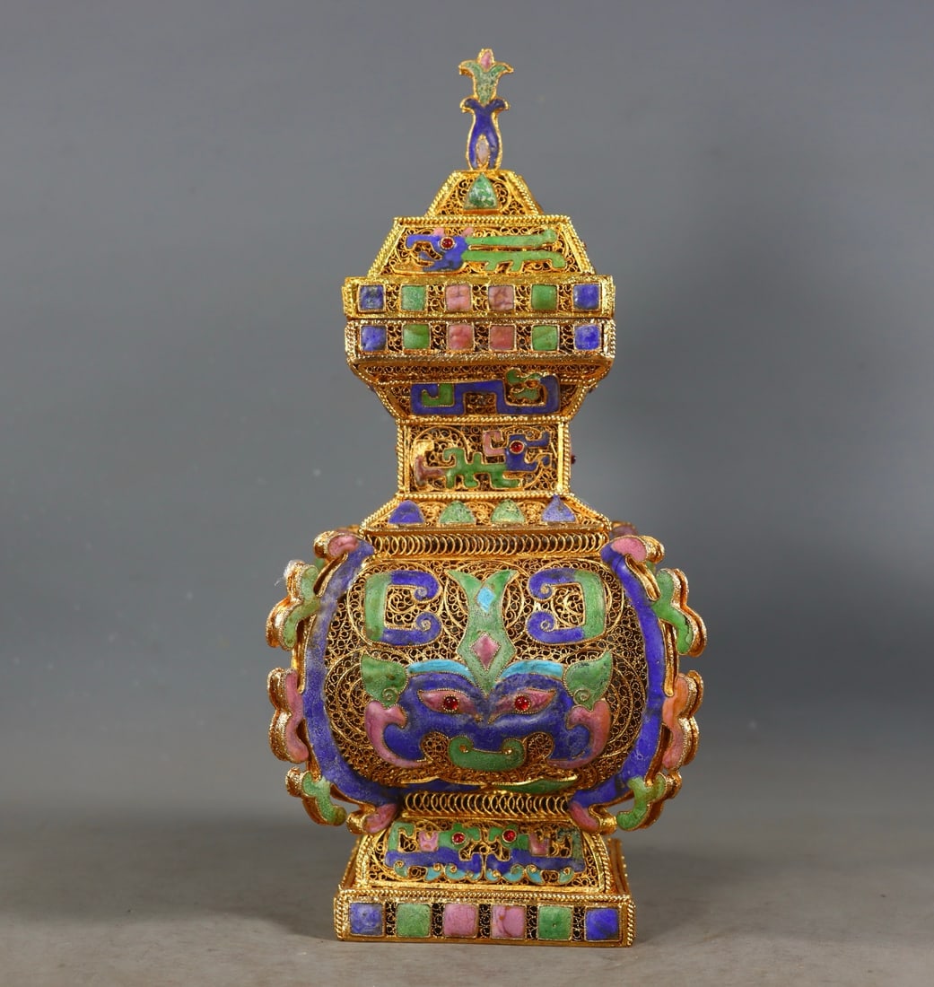 An Exquisite Gilt Bronze Inlaid Gems Beast-Face Pattern Vase: An Exquisite Gilt Bronze Inlaid Gems Beast-Face Pattern Vase Qing Dynasty, China Qianlong Four-character Mark Size: 28.5cmx13cm Weight:1015g (The Dimensions Of All Batches Are Manually Measured.If
